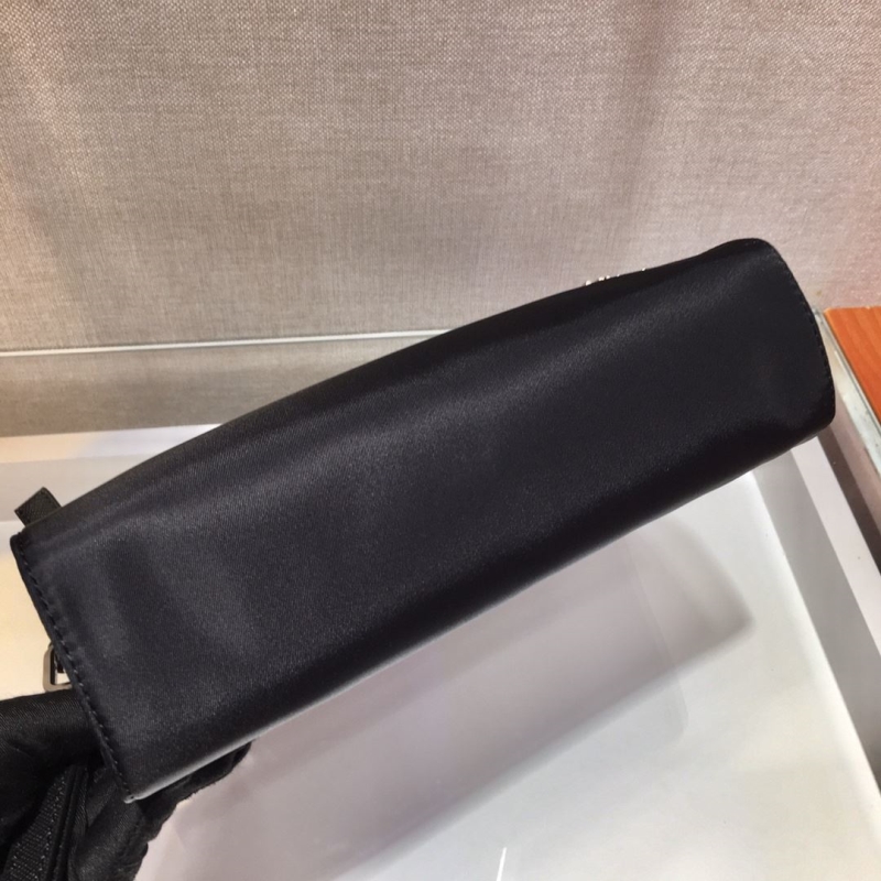 Pra*a clutch bags